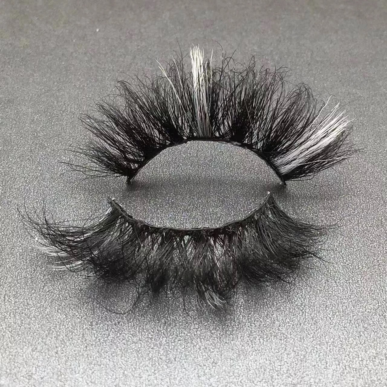 White Streak Drama Lashes Bold Volume with a Fierce Pop of White
